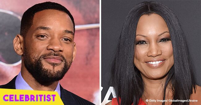 Garcelle Beauvais is under fire for sharing a photo of her kissing Will Smith on his 50th birthday