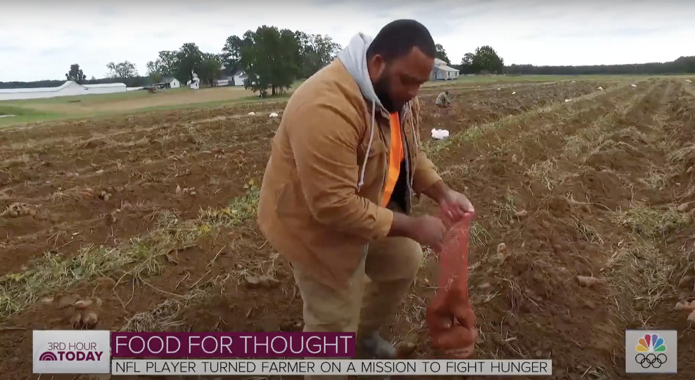 Jason Brown photographed holding sweet potatoes | Source: YouTube/Today