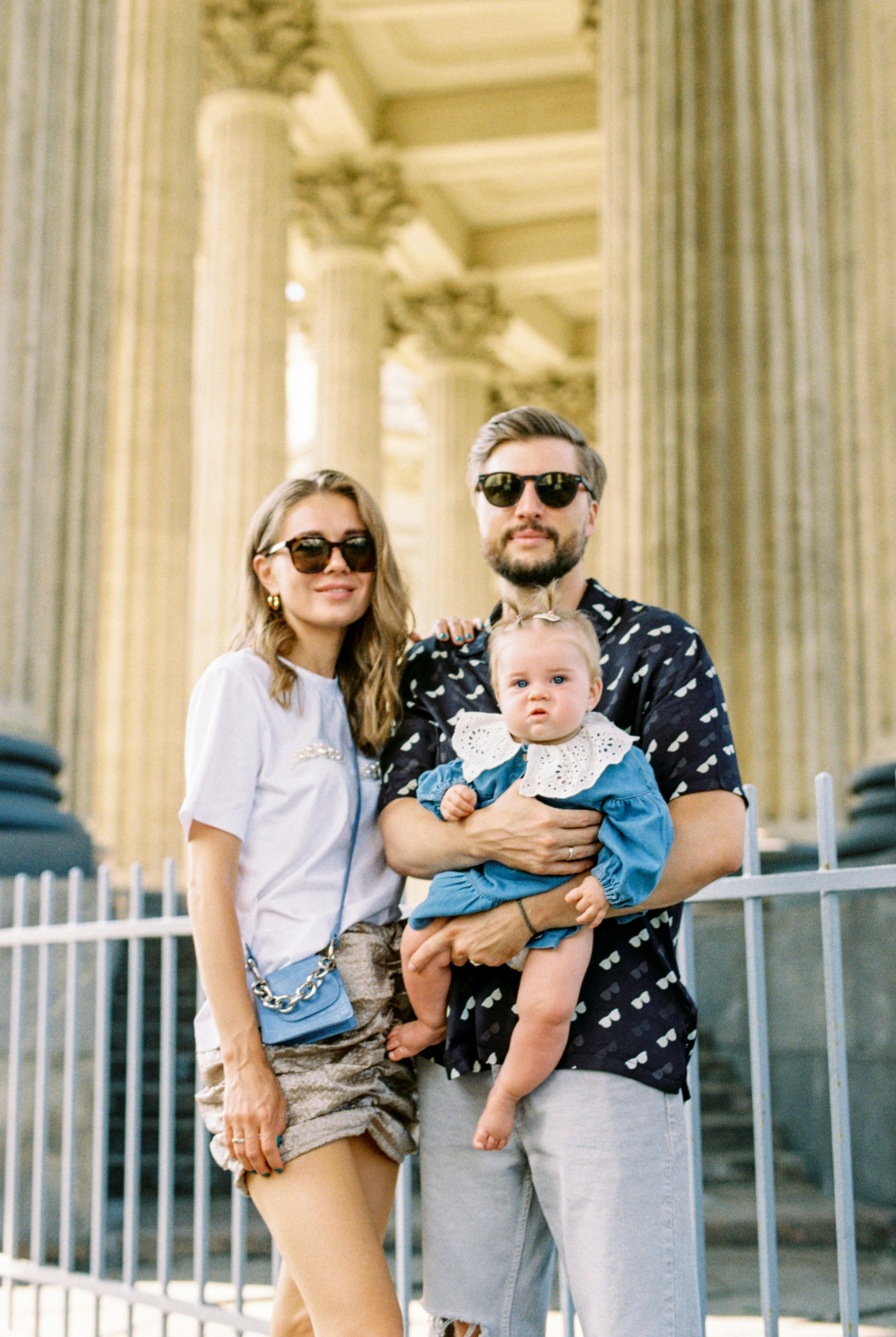 A young couple with their child | Source: Pexels