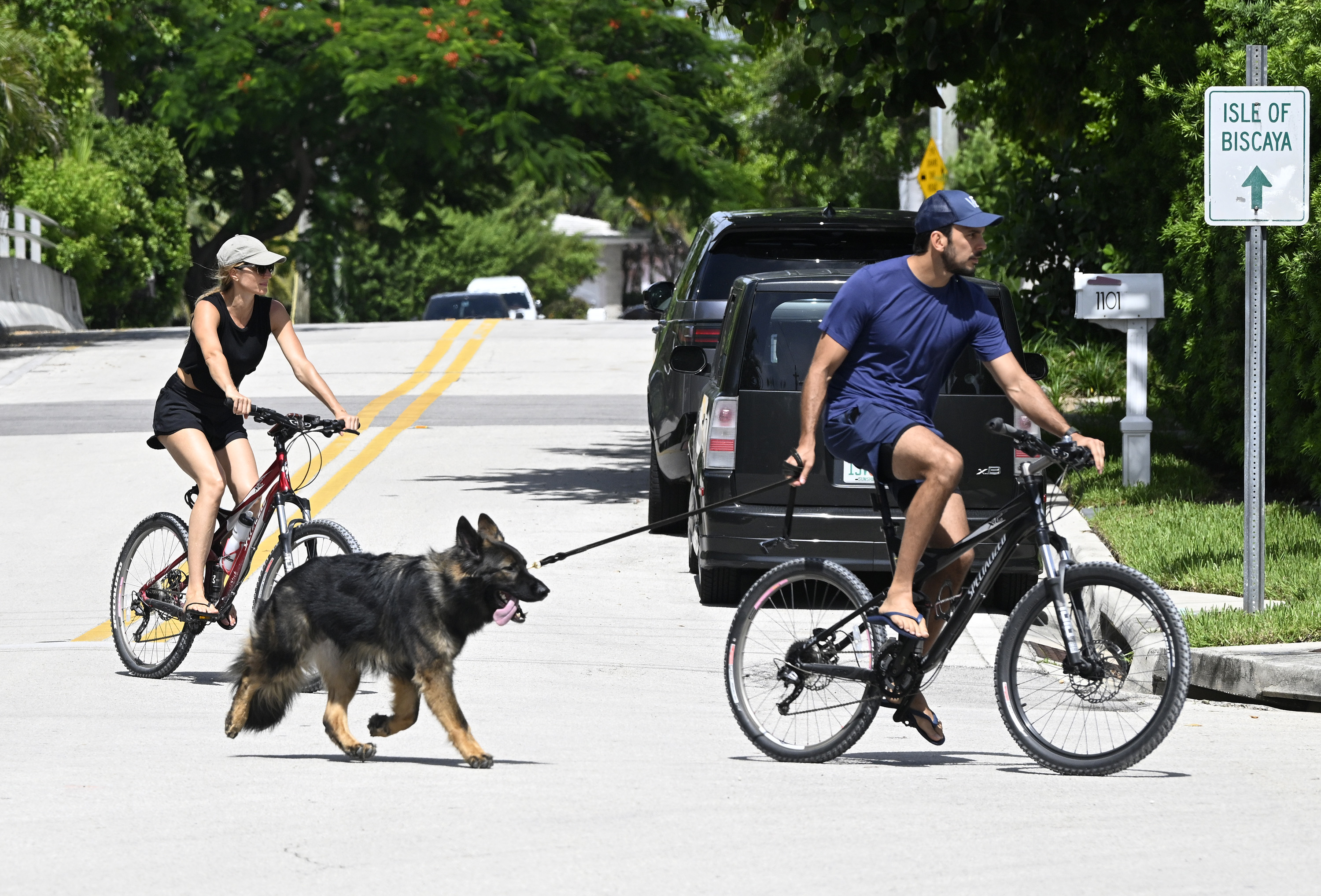 Joaquim Valente and Gisele Bündchen on a bike ride on July 14, 2024 in Surfside, Florida. | Source: Getty Images