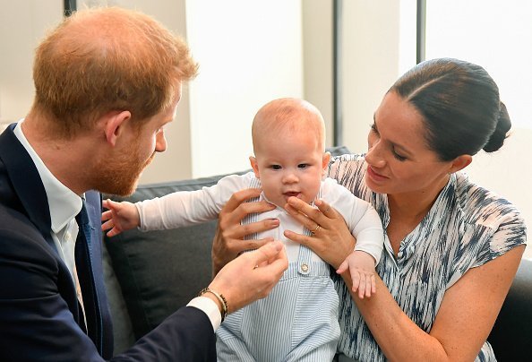 Prince Harry, Duke of Sussex, Meghan, Duchess of Sussex and their baby son Archie Mountbatten-Windsor meet Archbishop Desmond Tutu | Photo: Getty Images