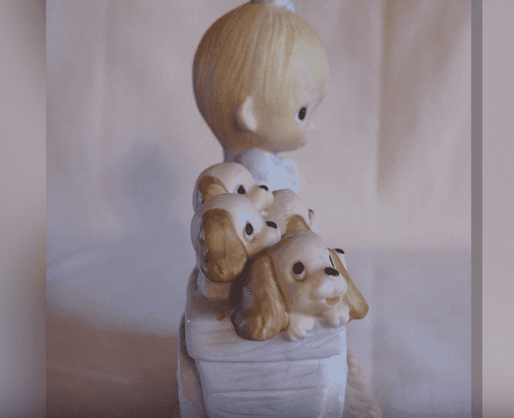 The original 21 Precious Moments figurine released in 1979, “God Loveth a Cheerful Giver” | Photo: YouTube/Southern Living