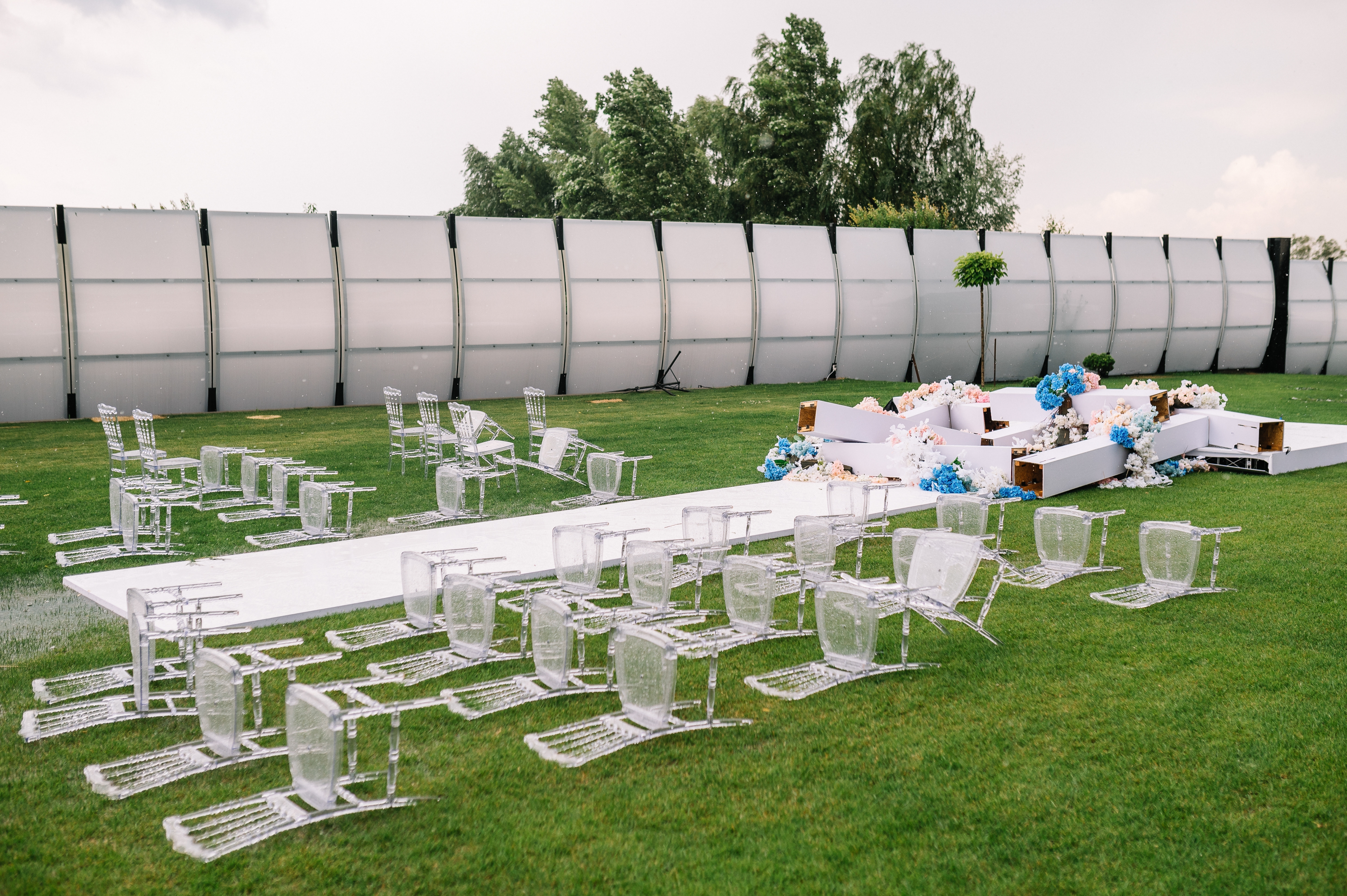 A damaged wedding setup due to rains and strong wind | Source: Shutterstock