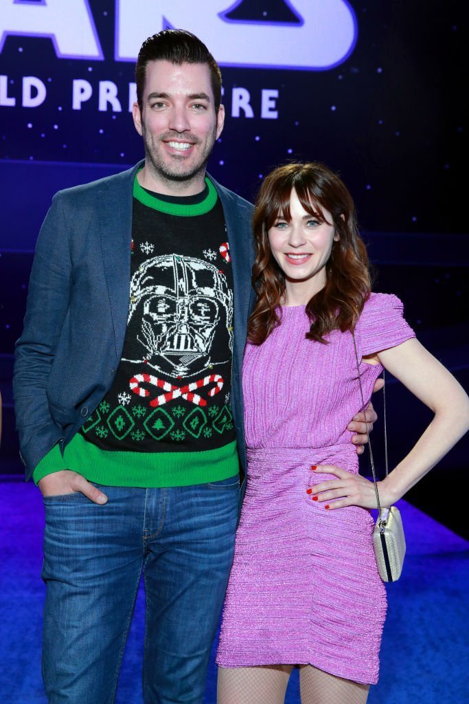 Drew Scott and Zooey Deschanel attend the Premiere of Disney's "Star Wars: The Rise Of Skywalker". | Photo: Getty Images