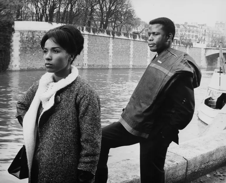 Diahann Carroll and Sidney Poitier during a scene from the movie "Paris Blues" in 1961 | Source: Getty Images