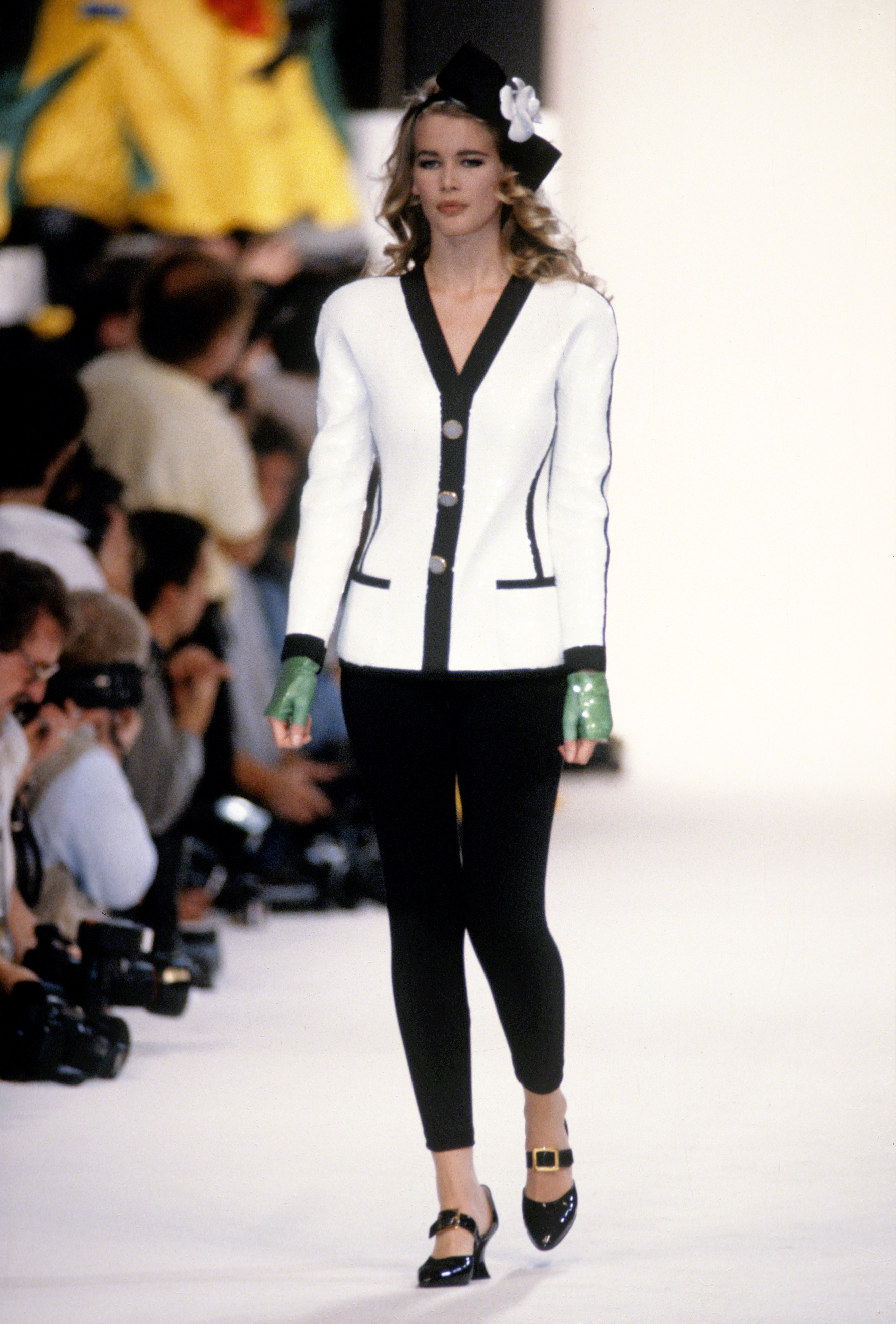 Claudia Schiffer walking for the Chanel show circa 1990, in Paris | Source: Getty Images