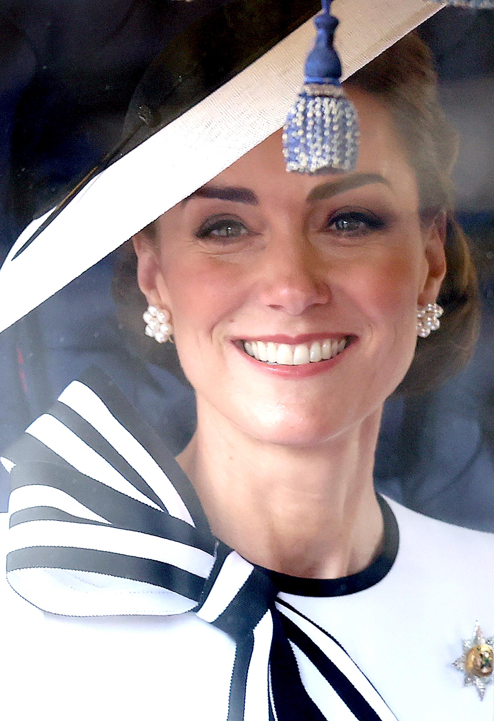 Catherine, Princess of Wales smiles as she travels by carriage during Trooping the Colour at Buckingham Palace in London, England, on June 15, 2024. | Source: Getty Images