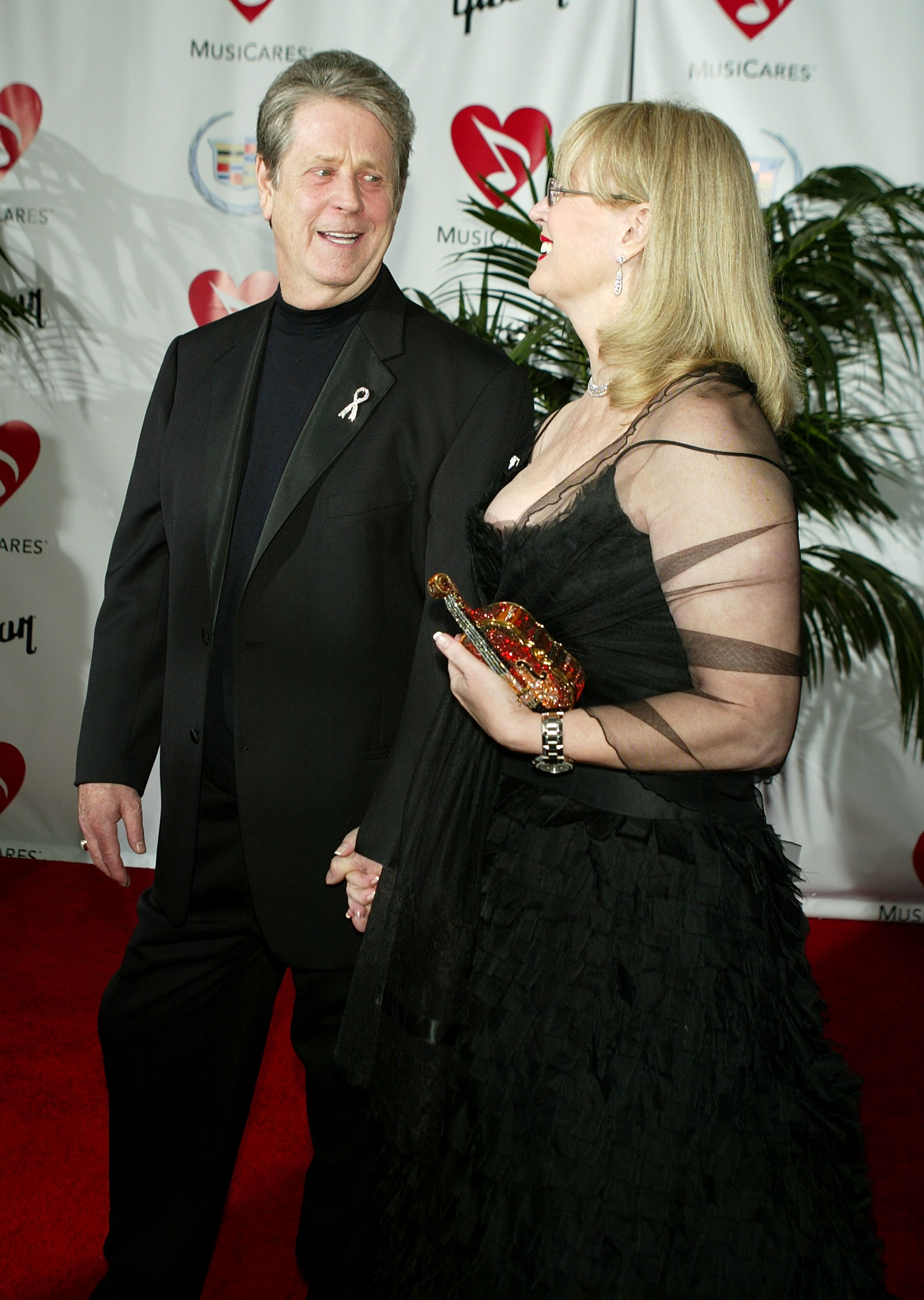 Brian and Melinda Wilson at the MusiCares 2005 Person of the Year Tribute to Brian Wilson at the Palladium on February 11 in Hollywood, California. | Source: Getty Images