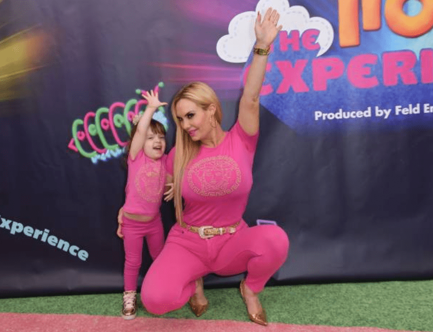 Coco Austin and her daughter, Chanel Nicole Marrow pose on the red carpet for the premiere of "Trolls The Experience," on November 14, 2018, in New York City. | Source: Angela Weiss / AFP via Getty Images