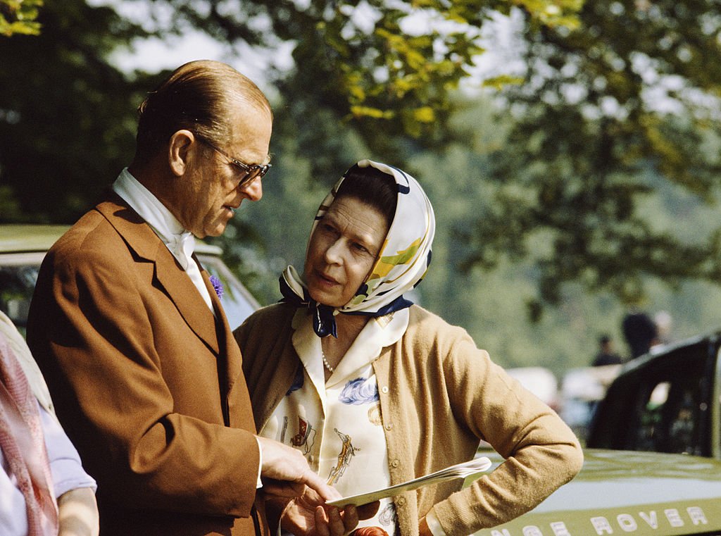 Prince Philip and his wife Queen Elizabeth in conversation | Photo: Getty Images