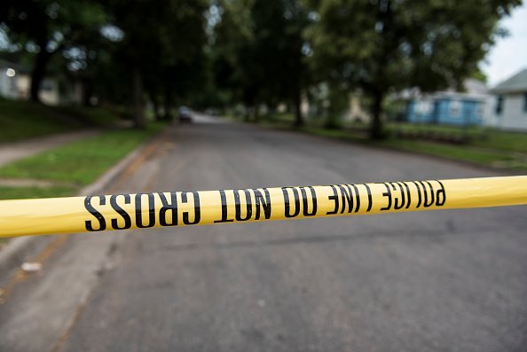 A piece of police tape at a crime scene | Photo: Getty Images
