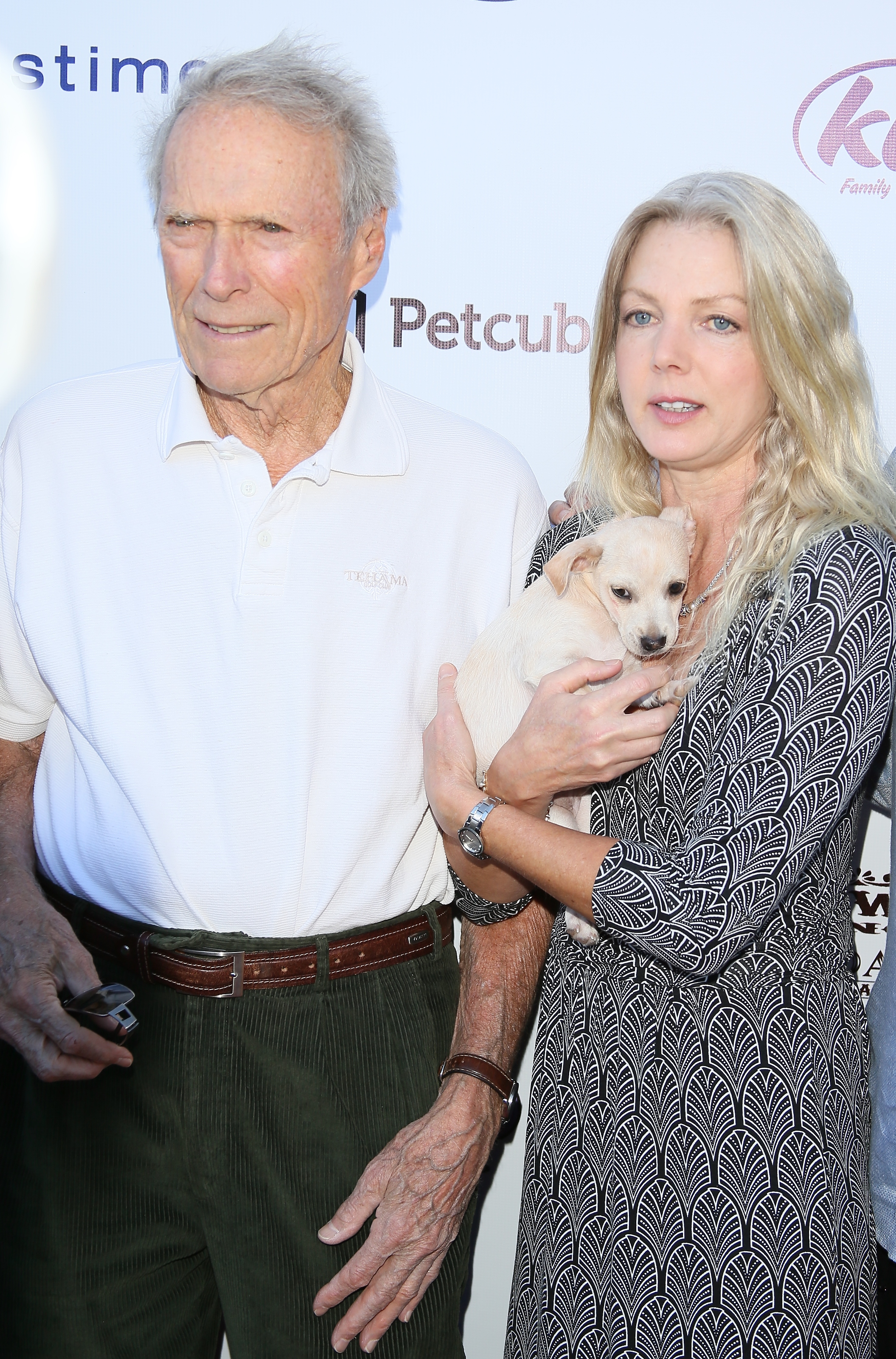 Clint Eastwood and Christina Sandera attend Eastwood Ranch Foundations hosts 1st annual Fall Garden Party Animal Rescue Fundraiser on November 7, 2015 in Malibu, California. | Source: Getty Images