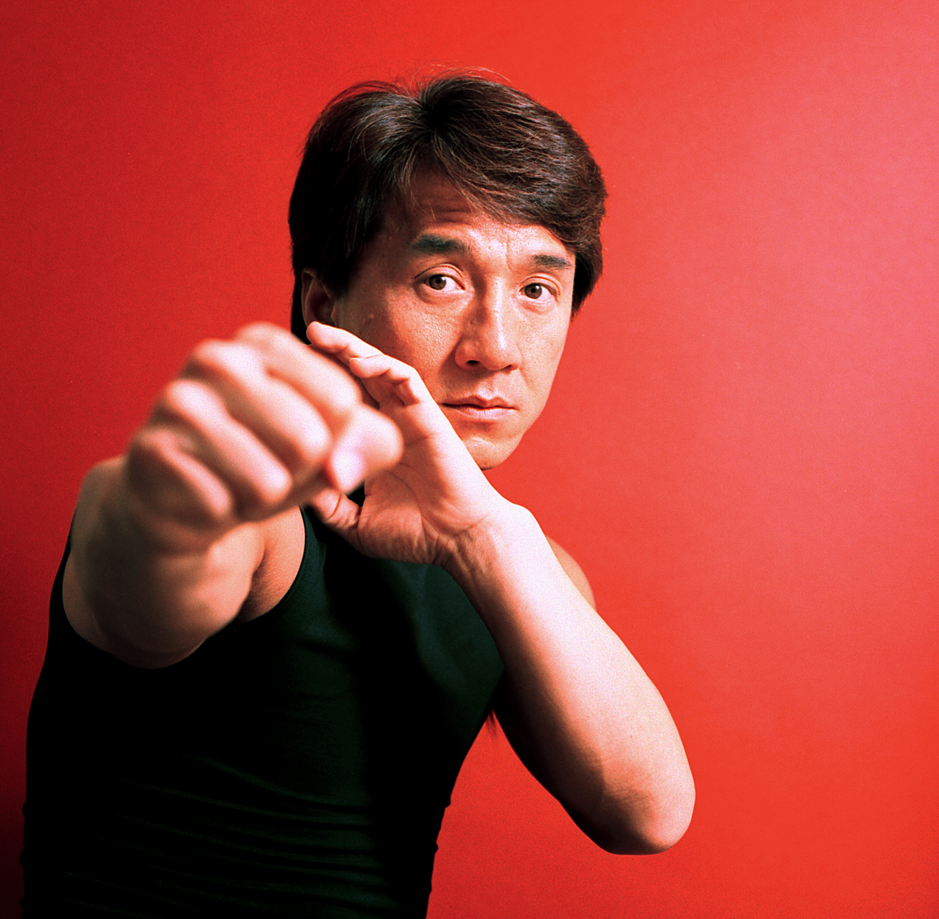 Jackie Chan during a portrait session in 2002. | Source: Getty Images