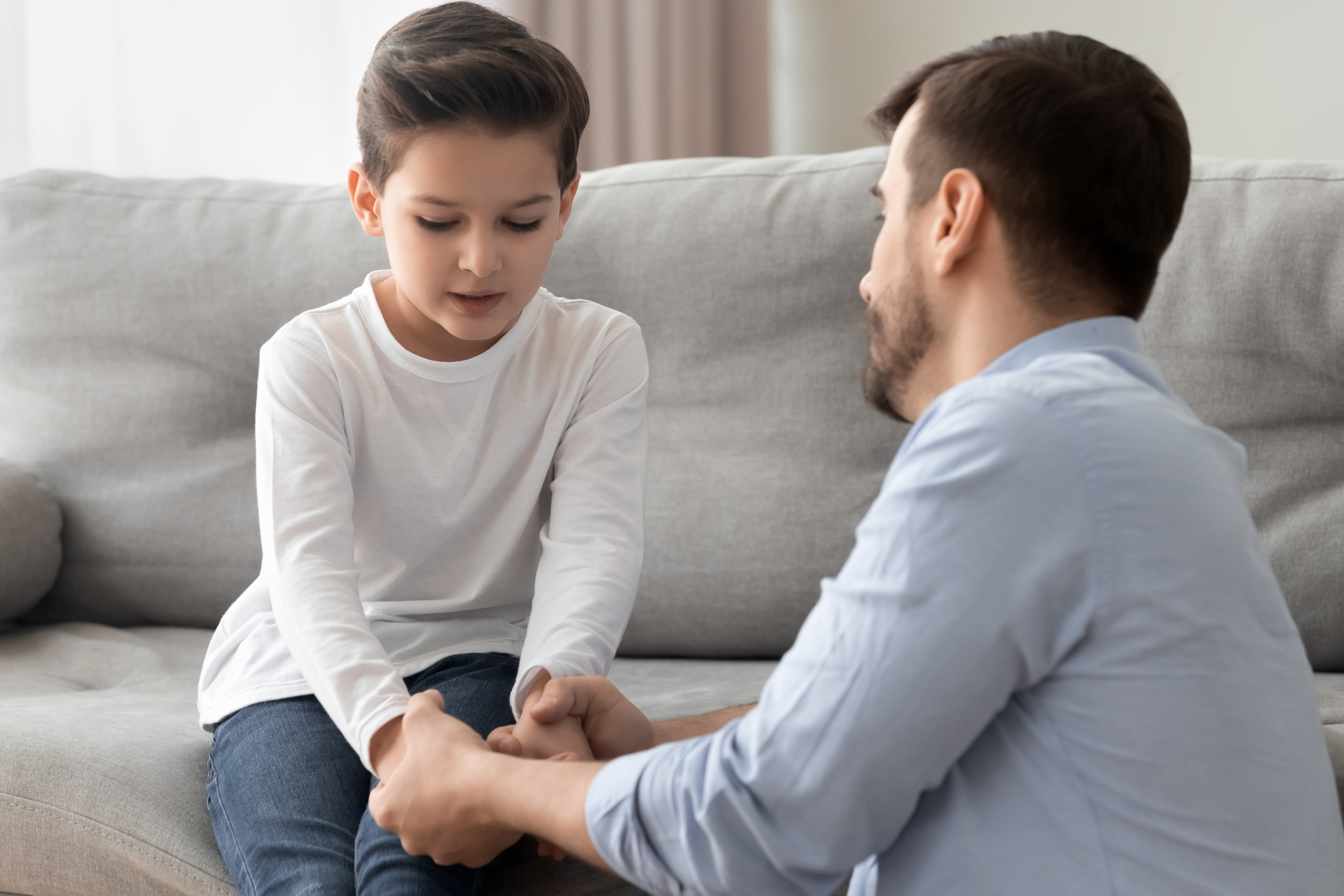 A father talking to his little son | Source: Shutterstock