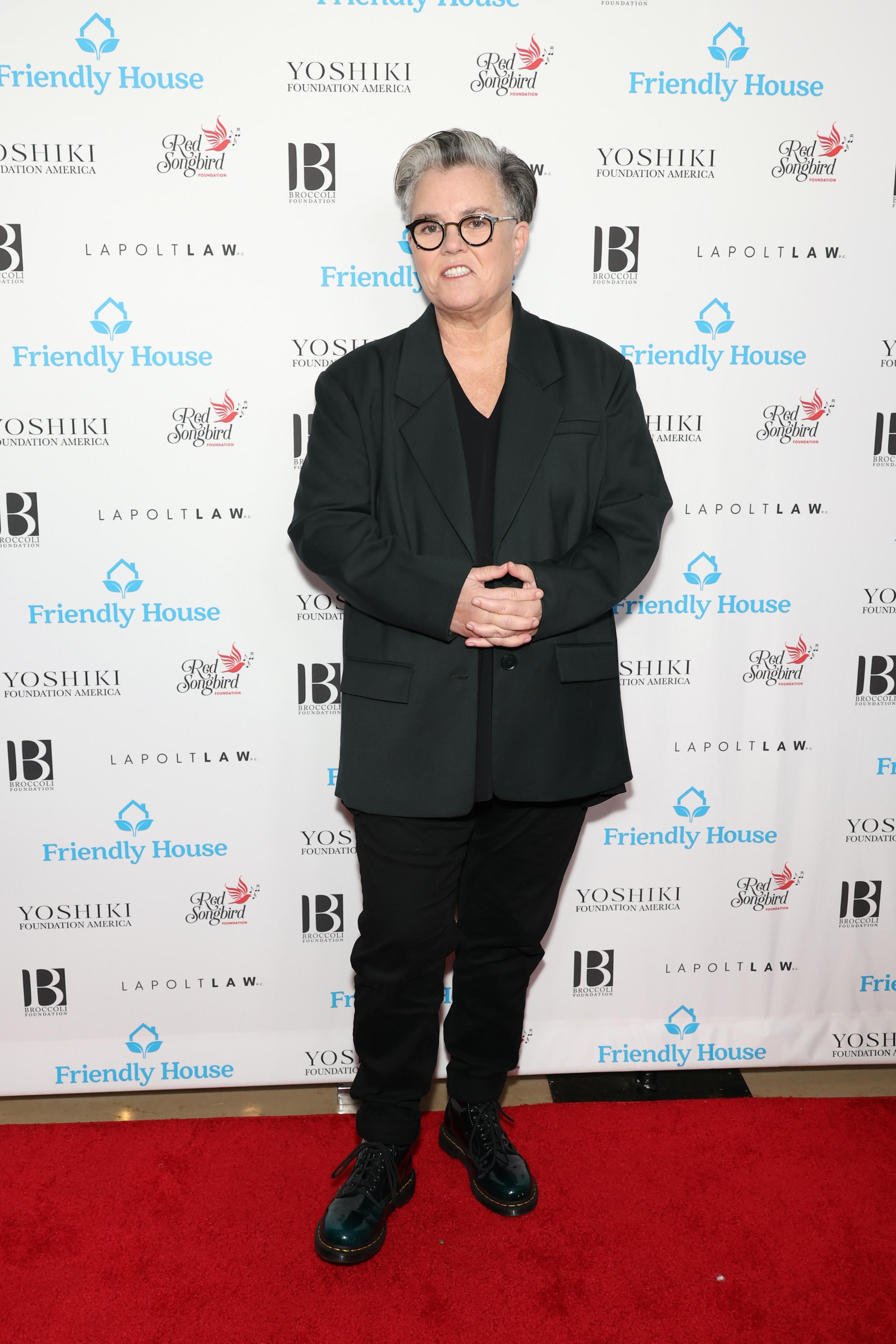 At the 33rd Annual Friendly House Awards Luncheon on October 28, 2023, Rosie O'Donnell looked sleek in an all-black pantsuit. With her silver hair swept back and glasses on, she exuded poise on the red carpet in Beverly Hills.