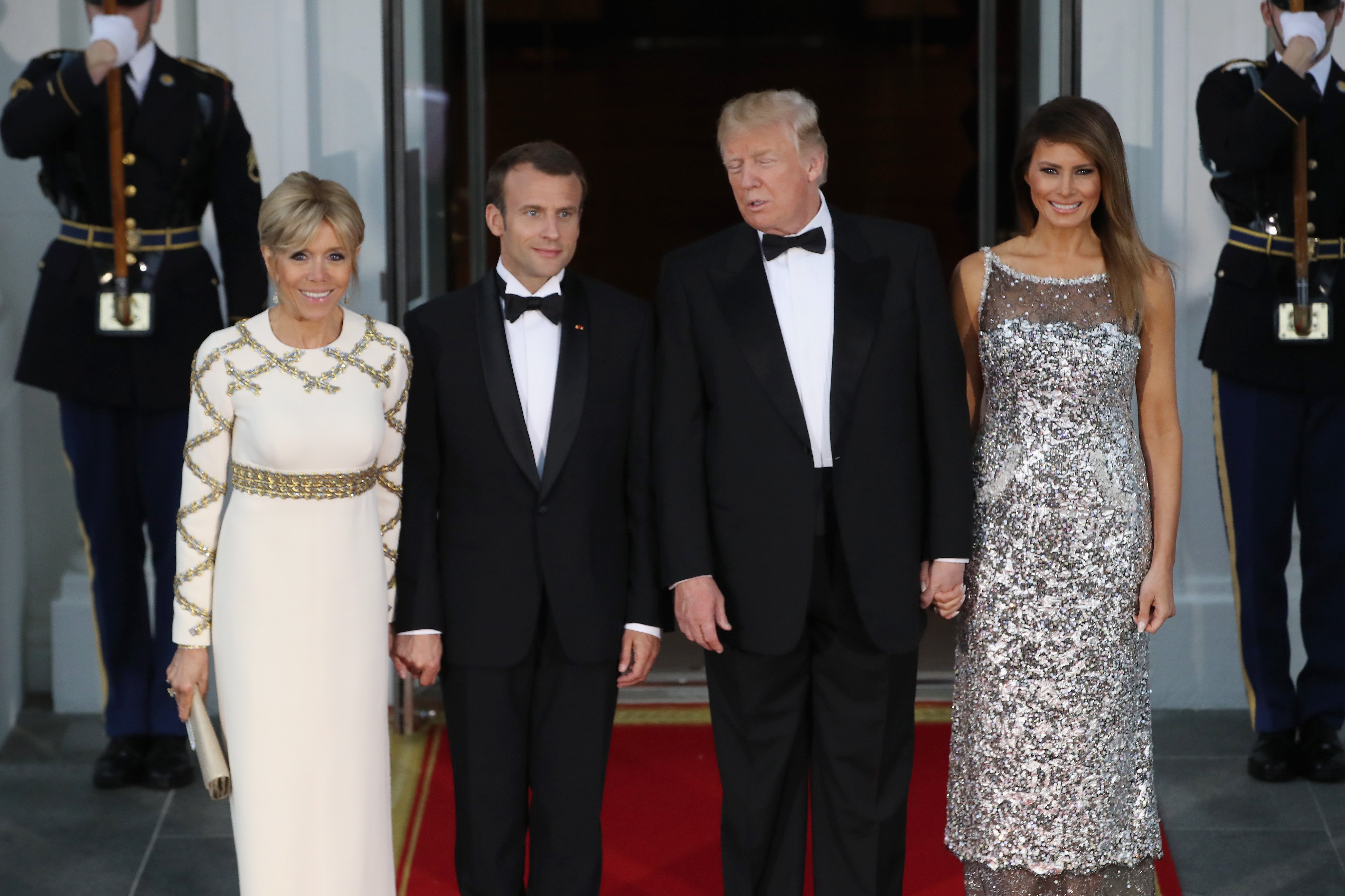 Brigitte Macron en robe de soirée pour un repas officiel. l Source: Getty Images