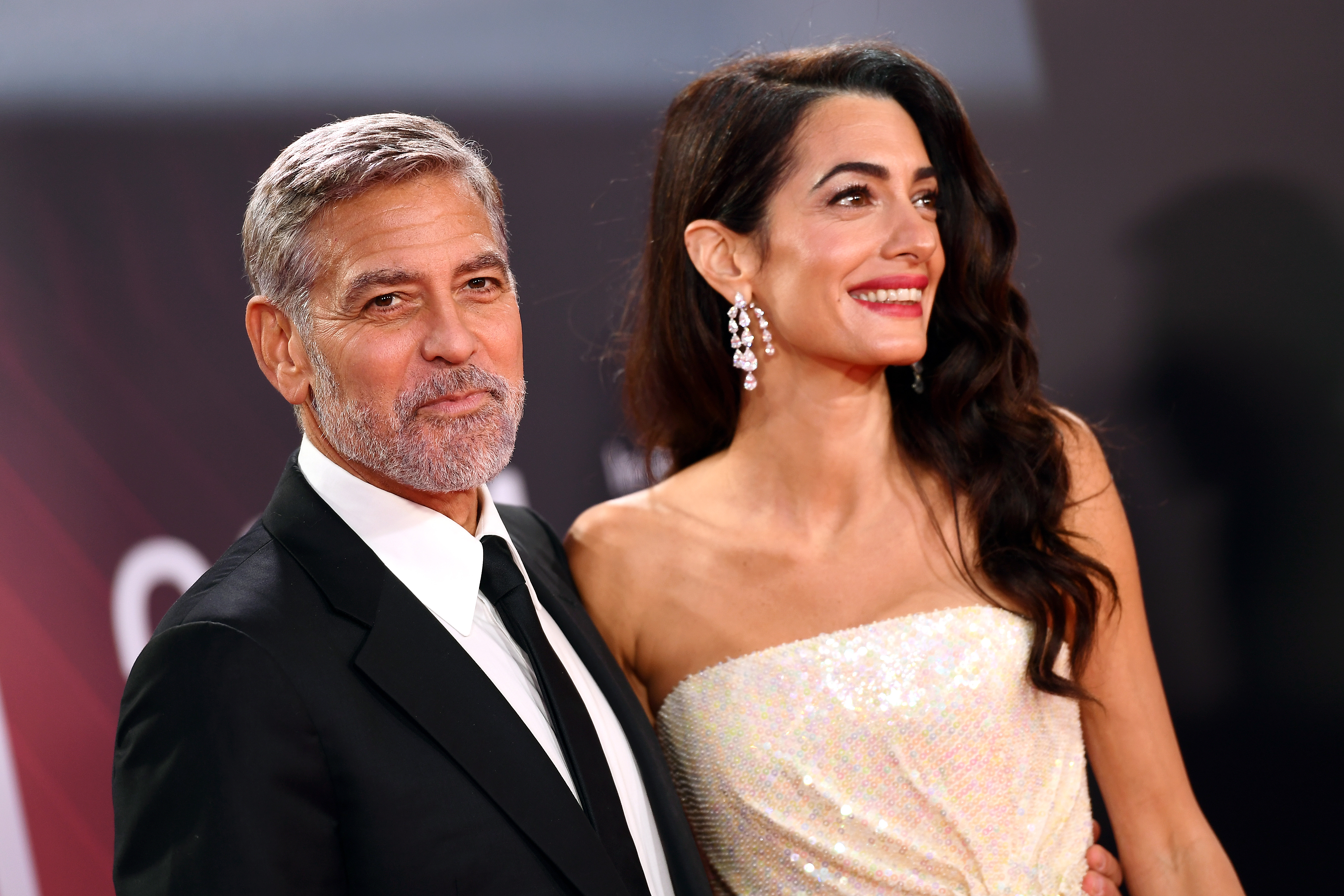 George Clooney and Amal Clooney attend "The Tender Bar" premiere during the 65th BFI London Film Festival at The Royal Festival Hall on October 10, 2021 in London, England | Source: Getty Images