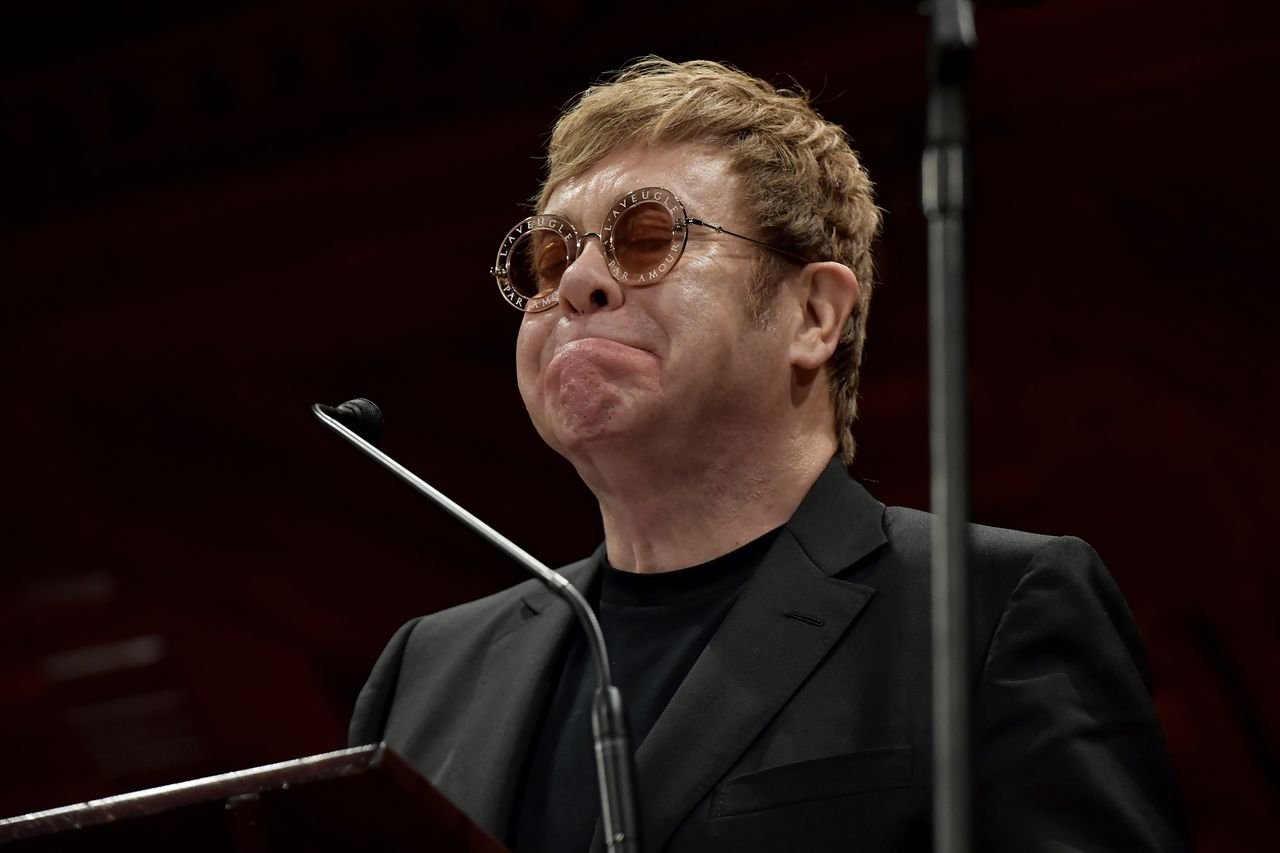 Elton John receives the 2017 Humanitarian of the Year Award at Harvard University. | Source: Getty Images