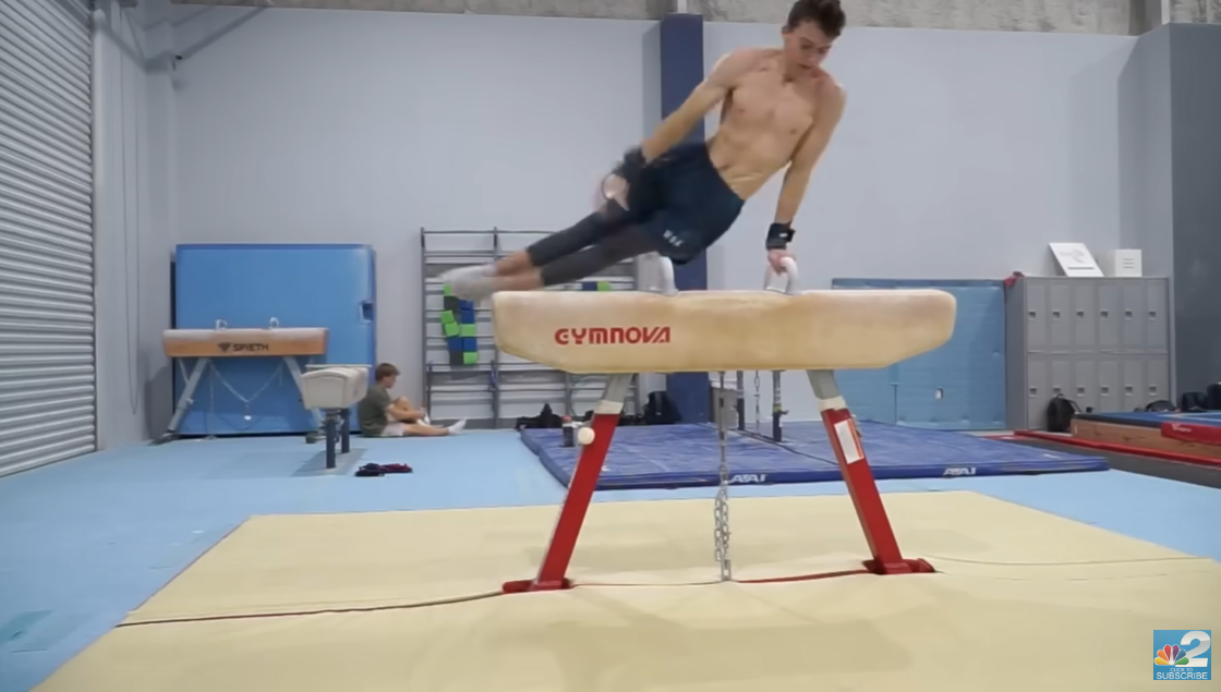 Stephen Nedoroscik performs his pommel horse routine during an NBC2 News interview on July 23, 2024 | Source: YouTube/NBC2swfl