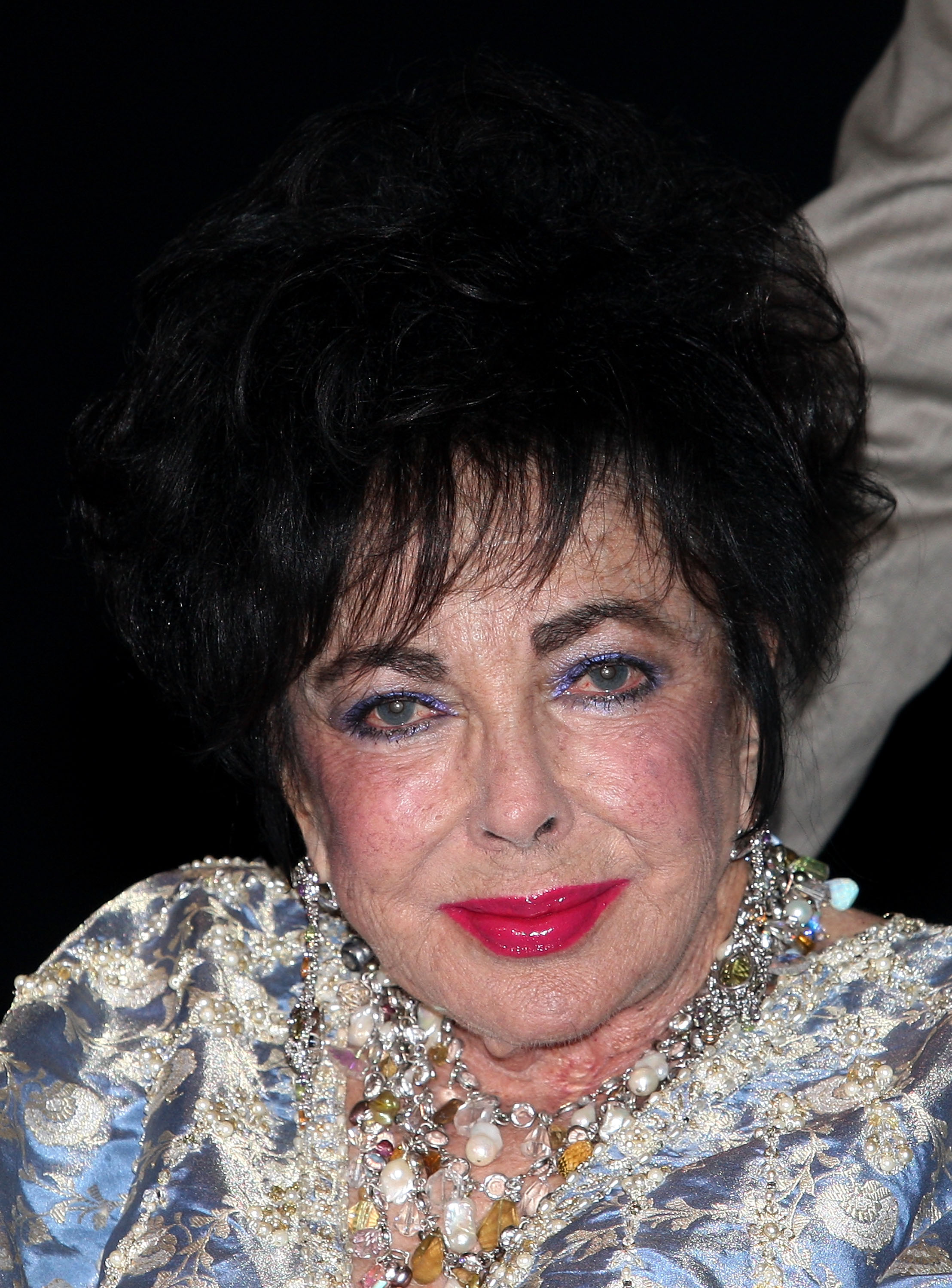 Dame Elizabeth Taylor attends Macy's Passport 2009 Fashion Show on September 24, 2009, in Santa Monica, California.