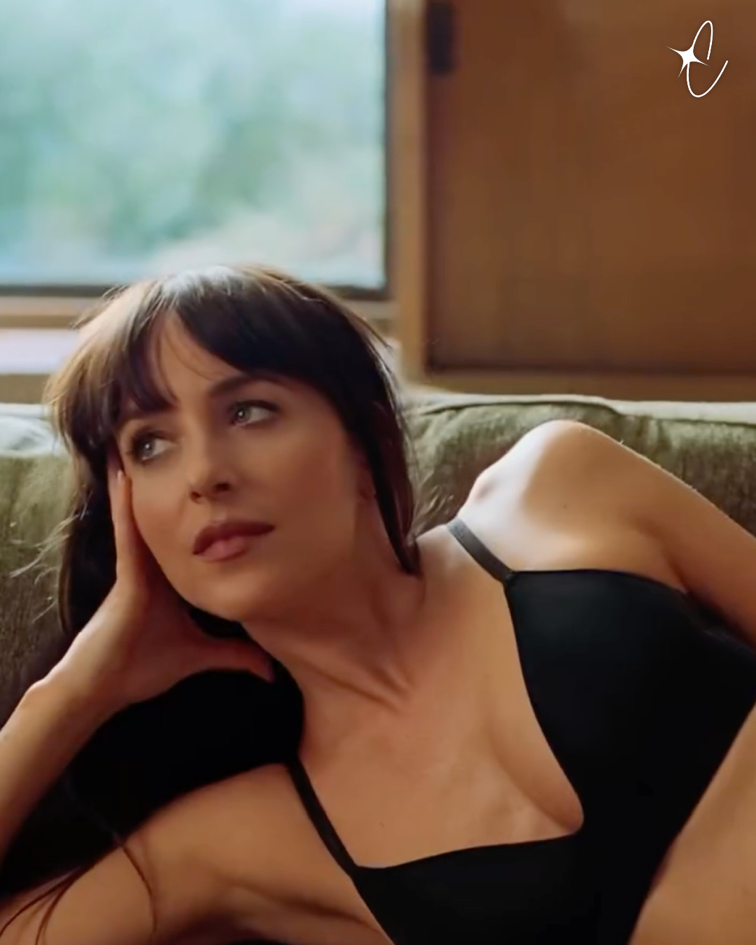 Dakota Johnson posing in a Calvin Klein bra for the fashion brand's new campaign, posted on March 9, 2026. | Source: Instagram/calvinklein
