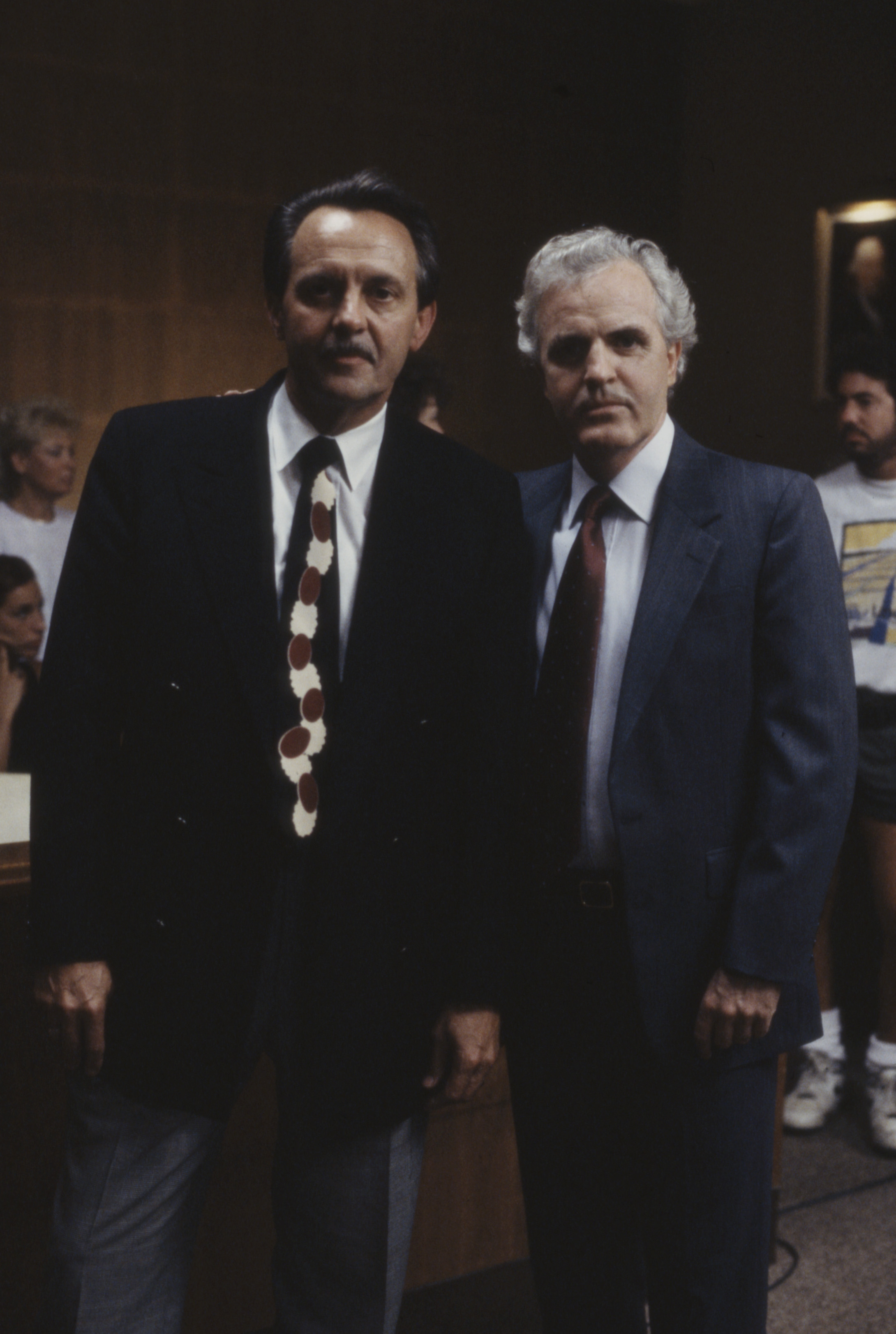 Enacting one of his many TV roles alongside a fellow actor, James Handy, who tragically died at 81-years-old, stares head-on during a scene from one of his earlier roles in the ABC TV movie, "False Arrest" in 1991. | Source: Getty Images