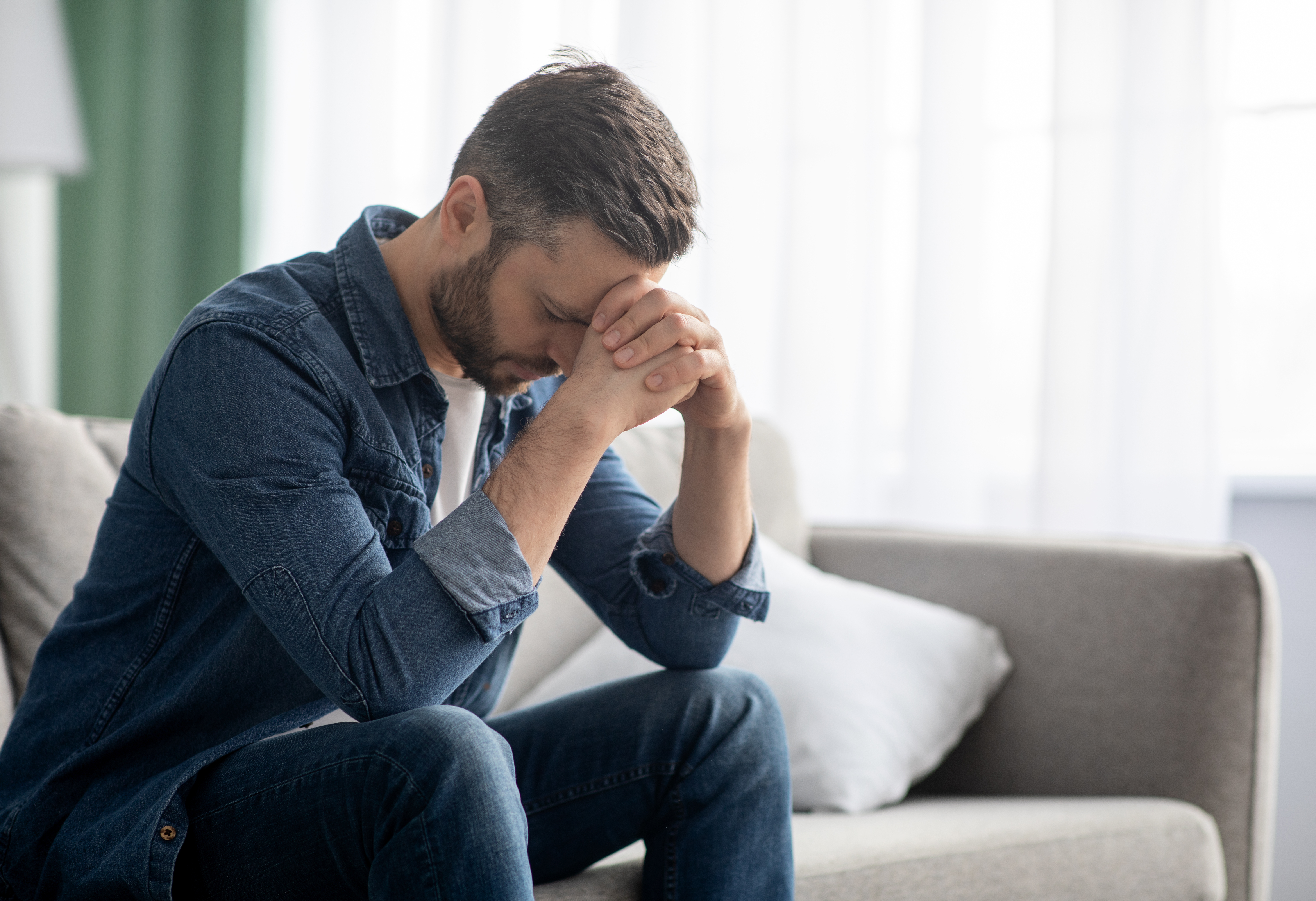 Depressed middle-aged man | Source: Shutterstock