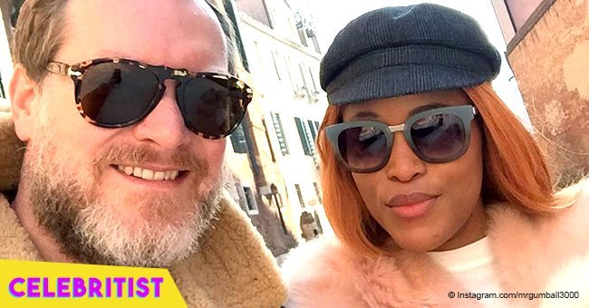 Eve & millionaire husband steal the show, posing by luxurious car in matching outfits