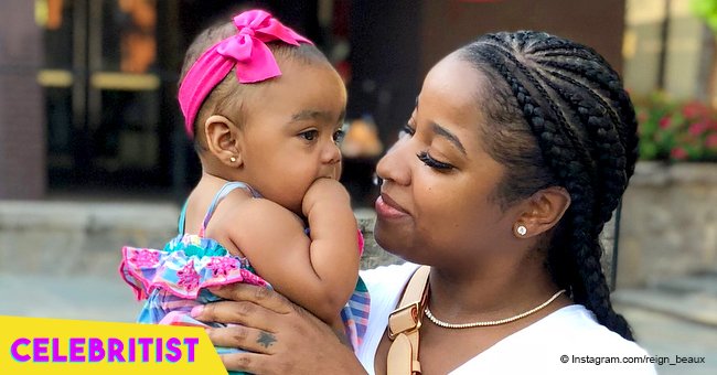 Toya Wright's daughter baby Reign is 'living her life' in miniature red & white swimsuit in pics