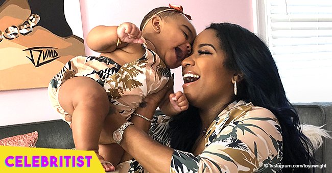 Baby Reign Rushing drives her own car in adorable photo by mom Toya Wright