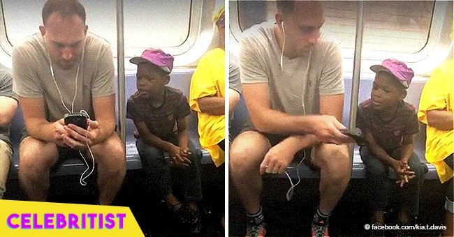 Adorable moment of man on subway letting little boy play on his phone went viral