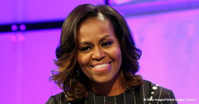 Michelle Obama is a lovely pop of color in vibrant dress that perfectly drapes her toned frame