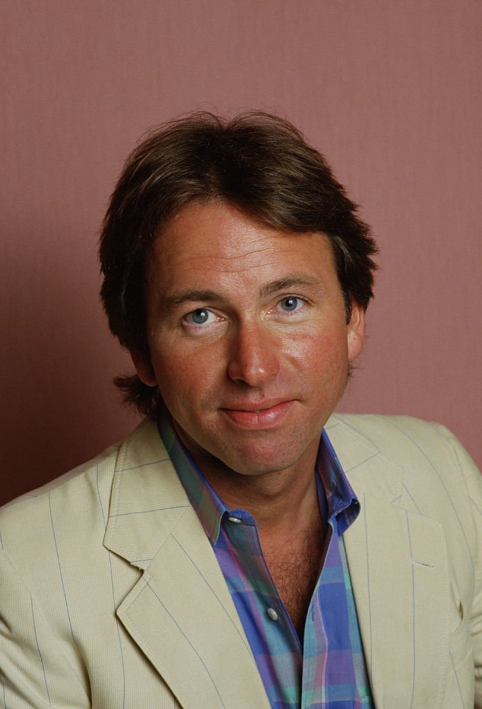 John Ritter, best known for his role as "Jack Tripper" on the hit TV series "Three's Company" poses during a 1987 studio portrait session in Beverly Hills, California | Photo: Getty Images