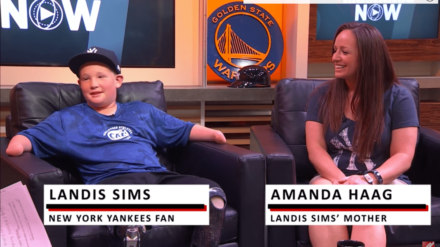 Landis Sims and his mother during an Interview with Sports Illustrated from June 15, 2017 | Source: Youtube/ Sports Illustrated 