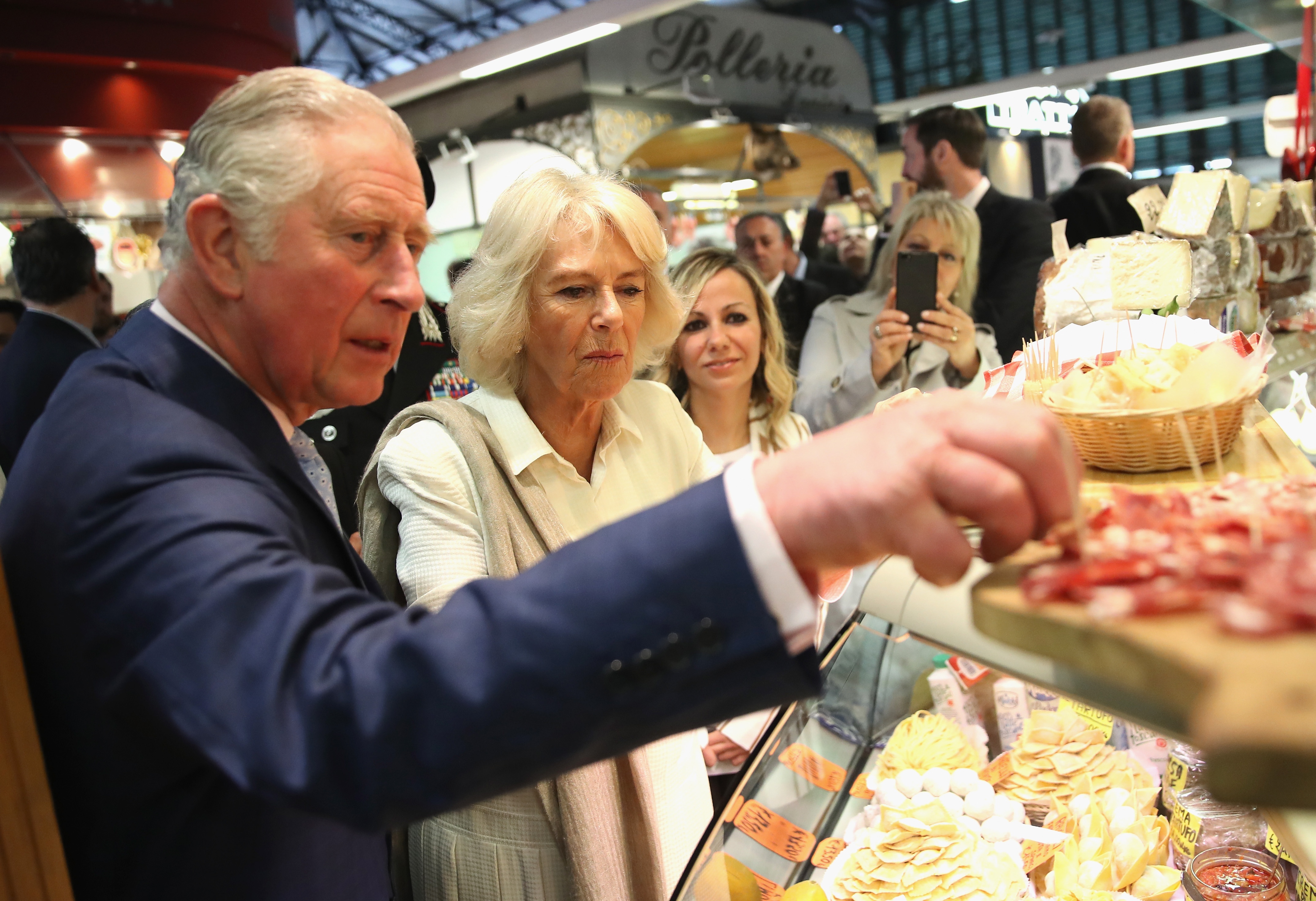 Prince Charles, Prince of Wales, and Camilla, Duchess of Cornwall visit SantAmbrogio Market and areas affected by the earthquakes of 2016, in Florence, Italy, on April 3, 2017 | Source: Getty Images