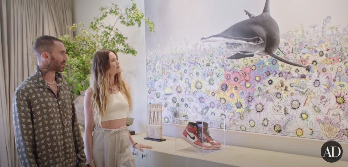 A picture on the wall in the kitchen of Adam Levine and Behati Prinsloo's family home | Photo: YouTube/Architectural Digest
