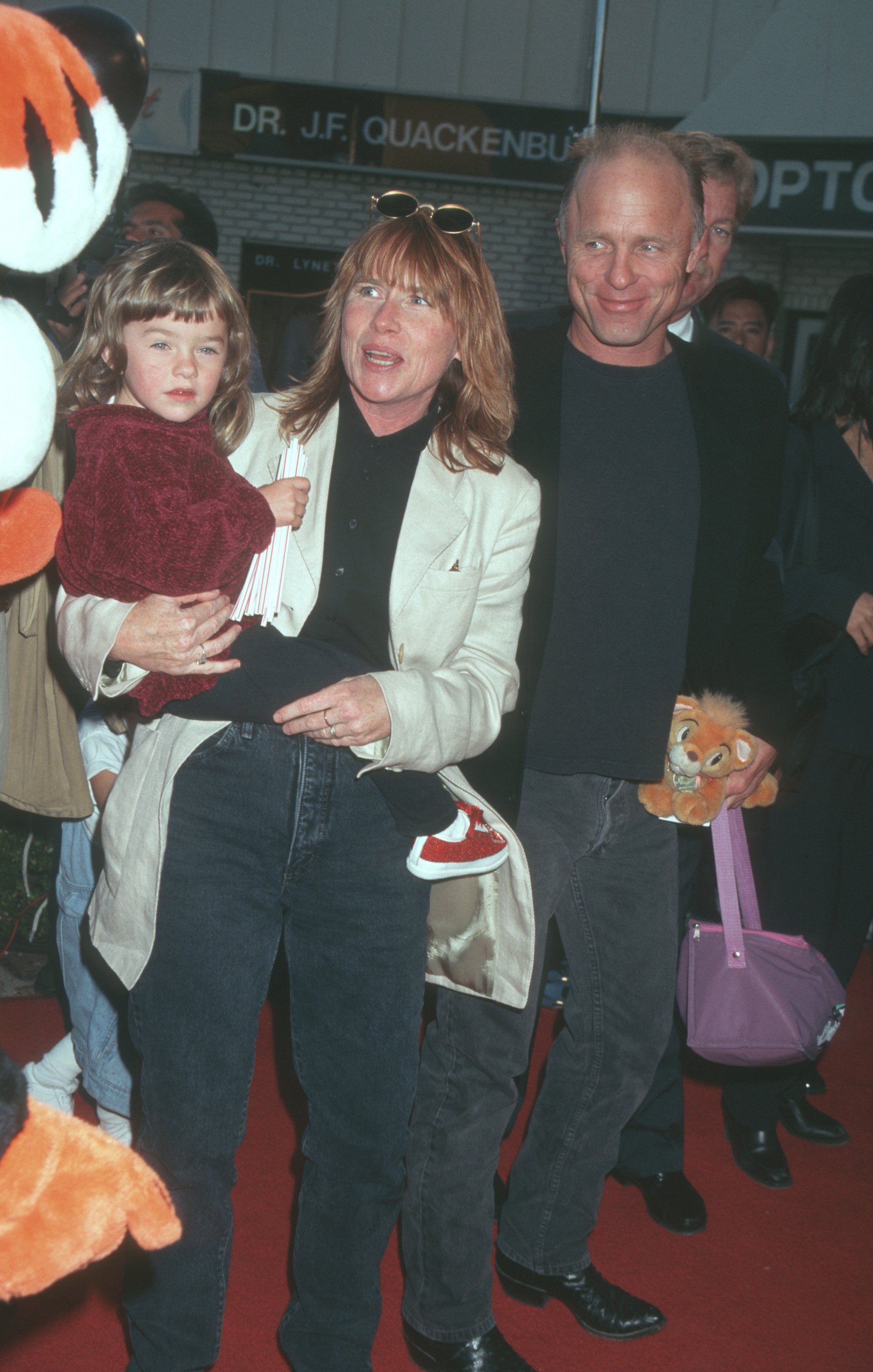 Lily Dolores Harris, Amy Madigan and Ed Harris during "The Aristicats" Video Release at Mann Village Theater - April 18, 1996 | Source: Getty Images