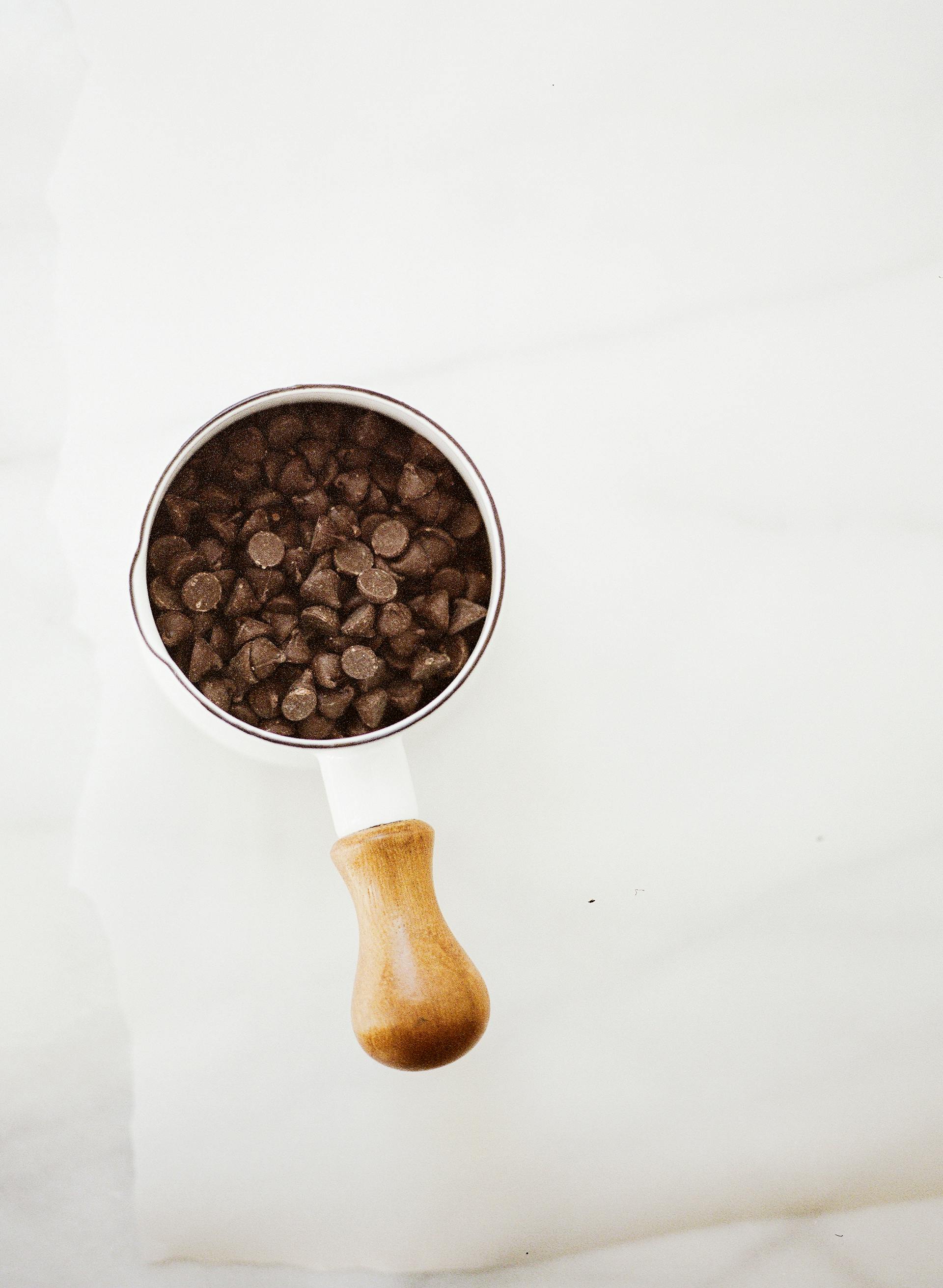 Chocolate chips in a container | Source: Pexels