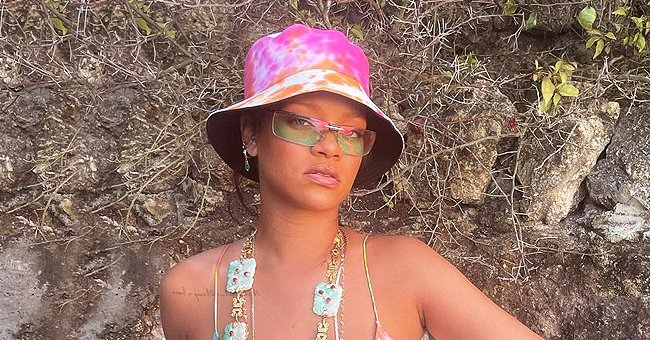 Rihanna Flaunts Her Curves in a $295 Retro Style Dress with a Hat ...