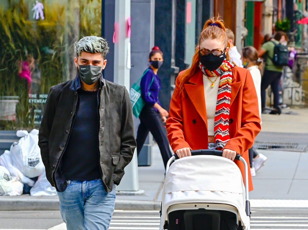 Zayn Malik and Gigi Hadid take baby Khai on a walk to lunch at The Smil, March 2021 | Source: Getty Images