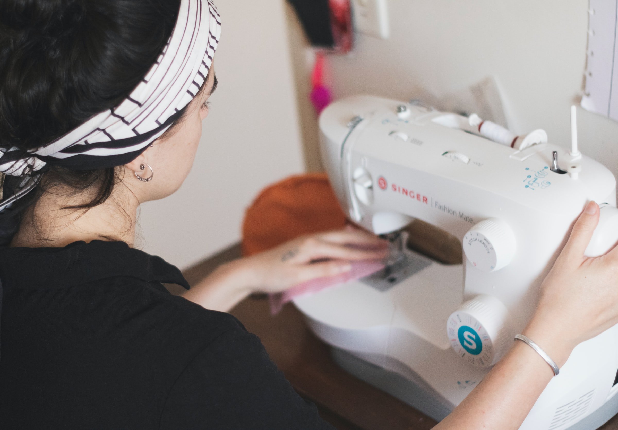 A seamstress at work. | Source: Unsplash