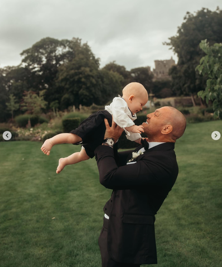 Conor McGregor plays with his son, Mack, at Terry Kavanagh and Erin McGregor's wedding on August 17, 2024 | Source: Instagram/thenotoriousmma