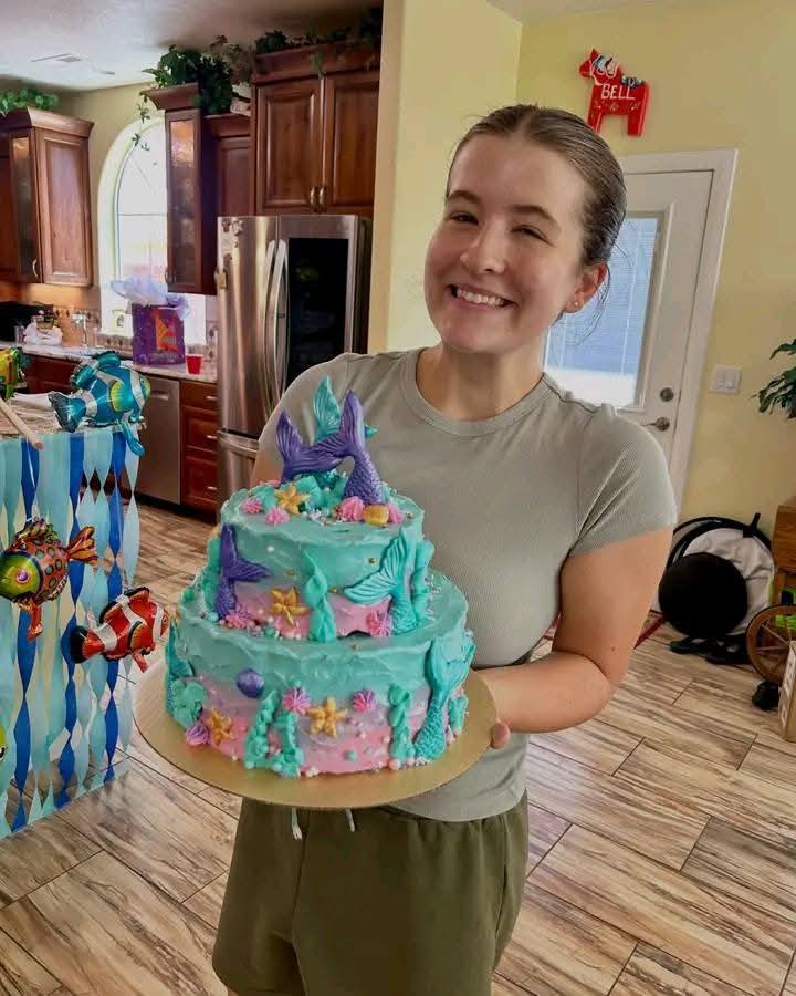 Nicole Bennett with a cake she decorated, from a post dated January 15, 2026 | Source: Facebook/Ewatomi Ojo