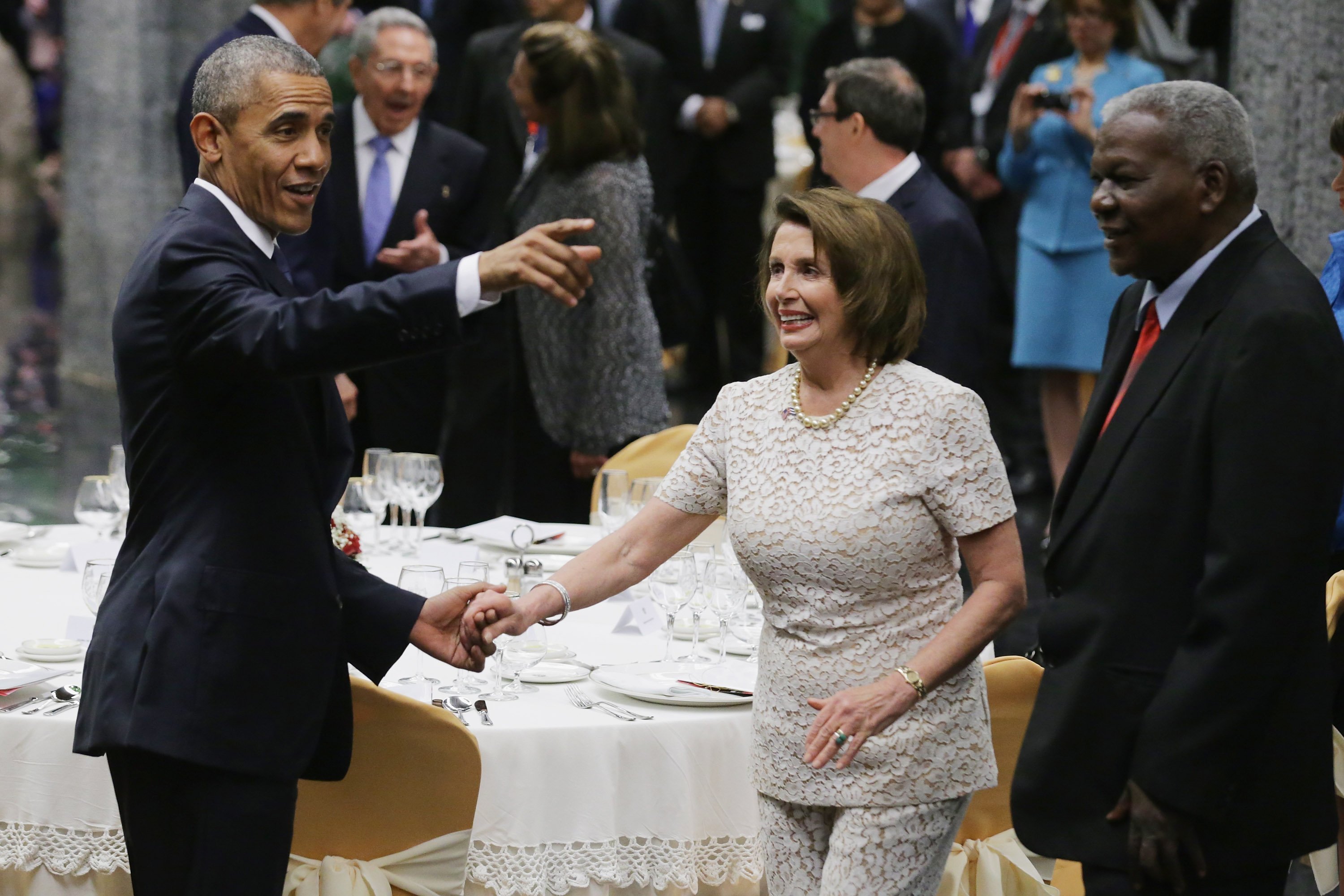 Barack Obama and Nancy Pelosi at a tate dinner at the Palace of the Revolution in Havana, Cuba | Photo: Getty Images