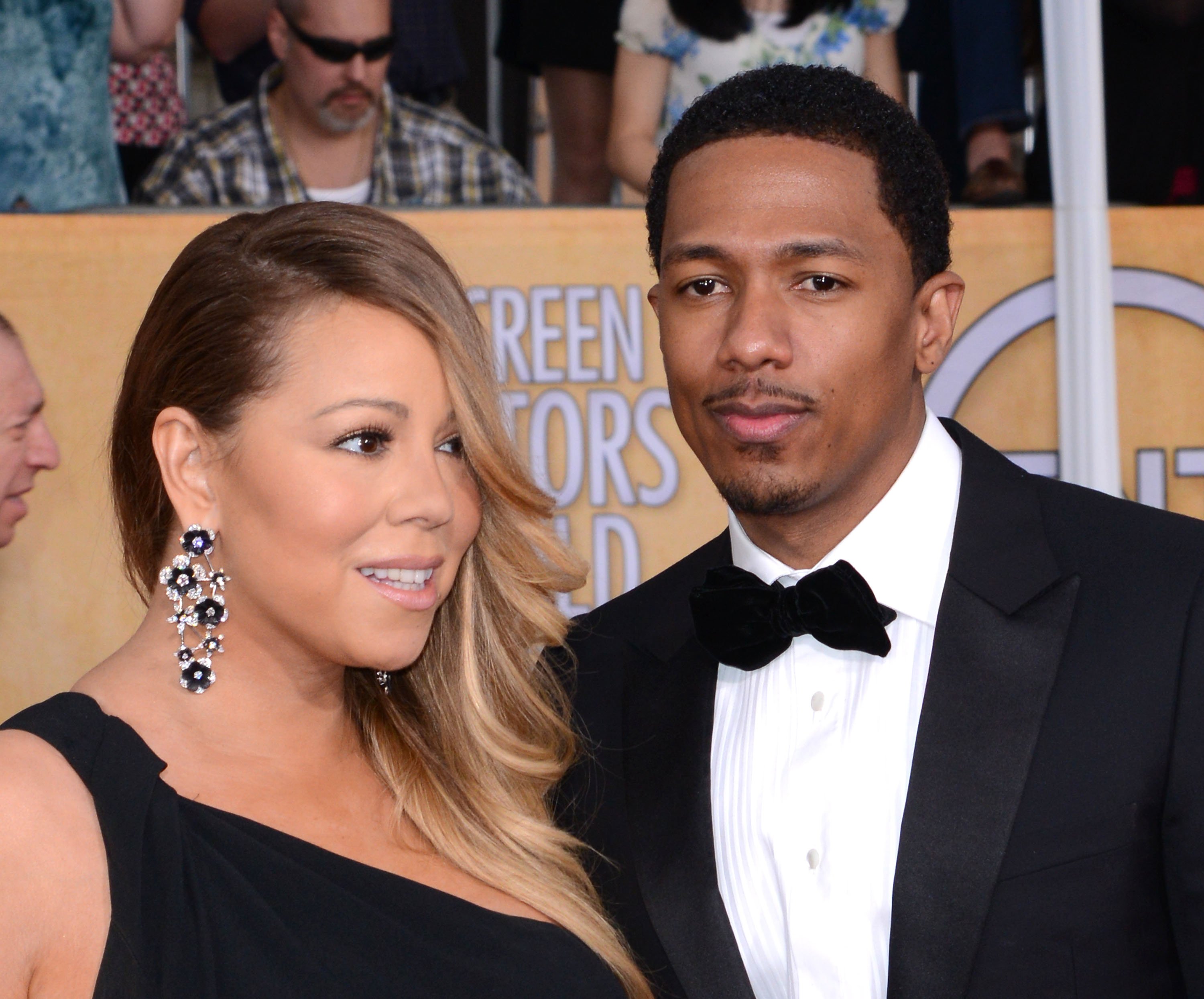 Mariah Carey and Husband Nick Cannon arrive at the 20th Annual Screen Actors Guild Awards at The Shrine Auditorium on January 18, 2014, in Los Angeles, California. | Source: Getty Images.