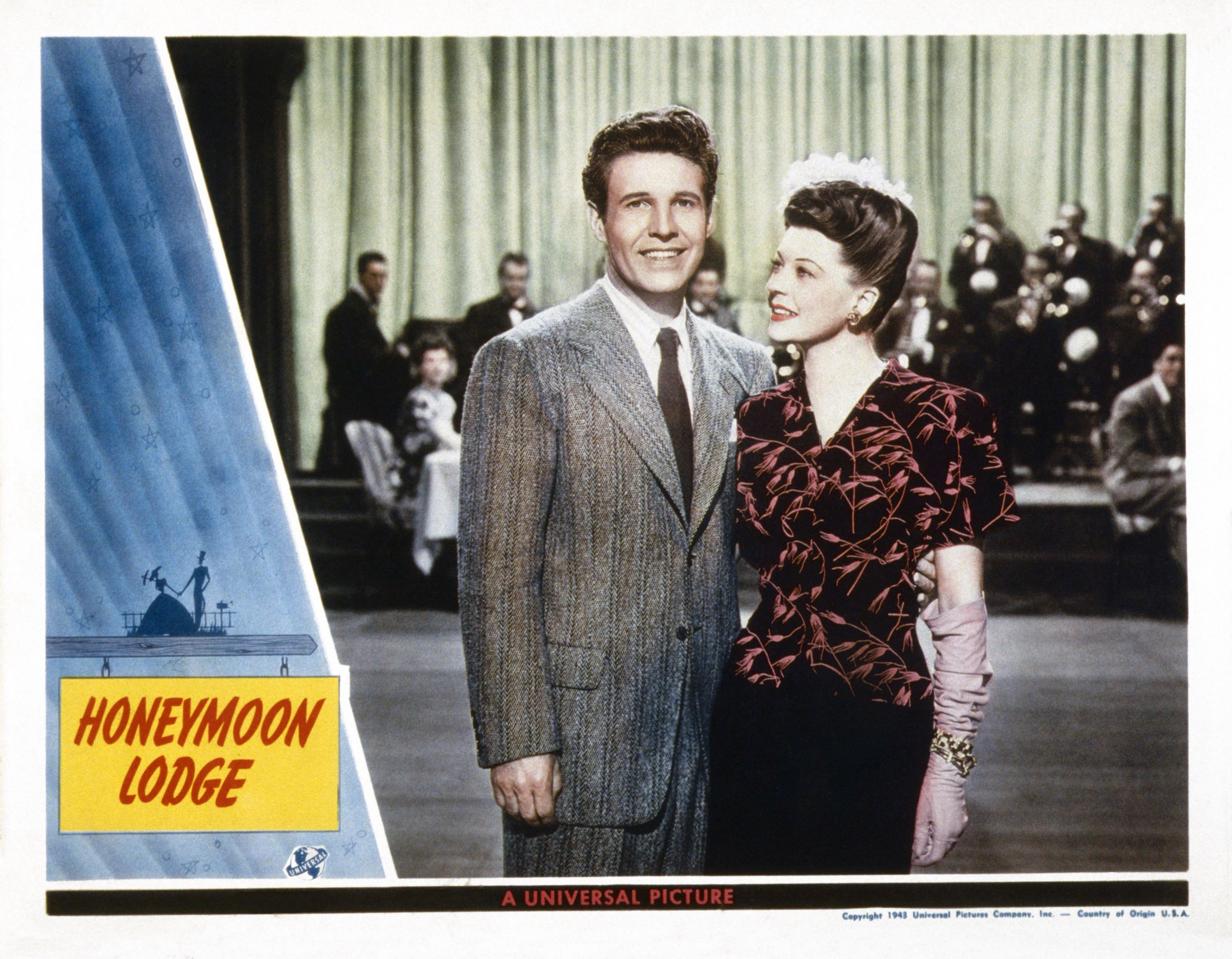 Ozzie Nelson and Harriet Hilliard in a Honeymoon Lodge, US lobby card, circa 1943. | Source: LMPC/Getty Images