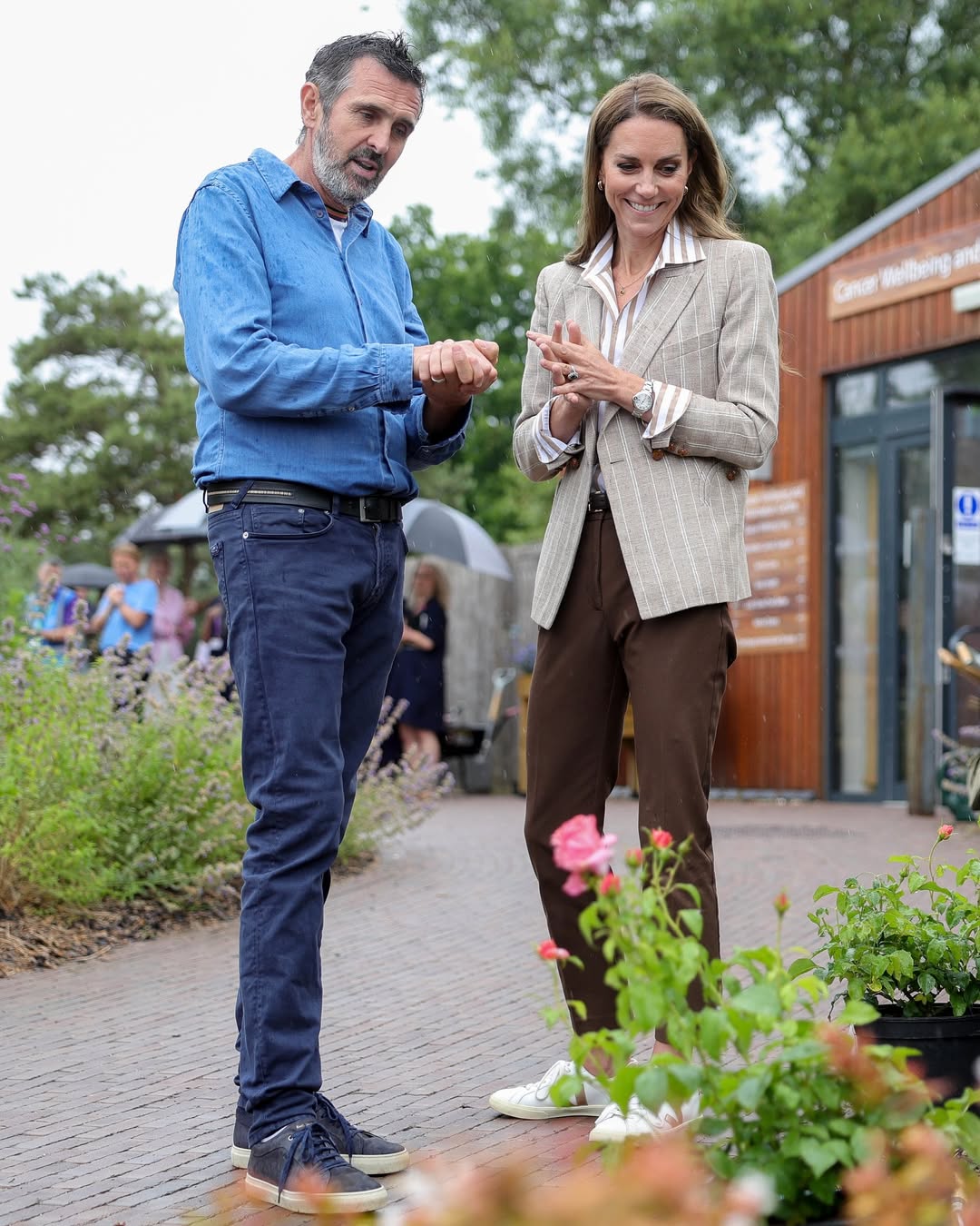 Kate Middleton and Adam Frost standing together while looking at a flower bed | Source: Instagram/princeandprincessofwales