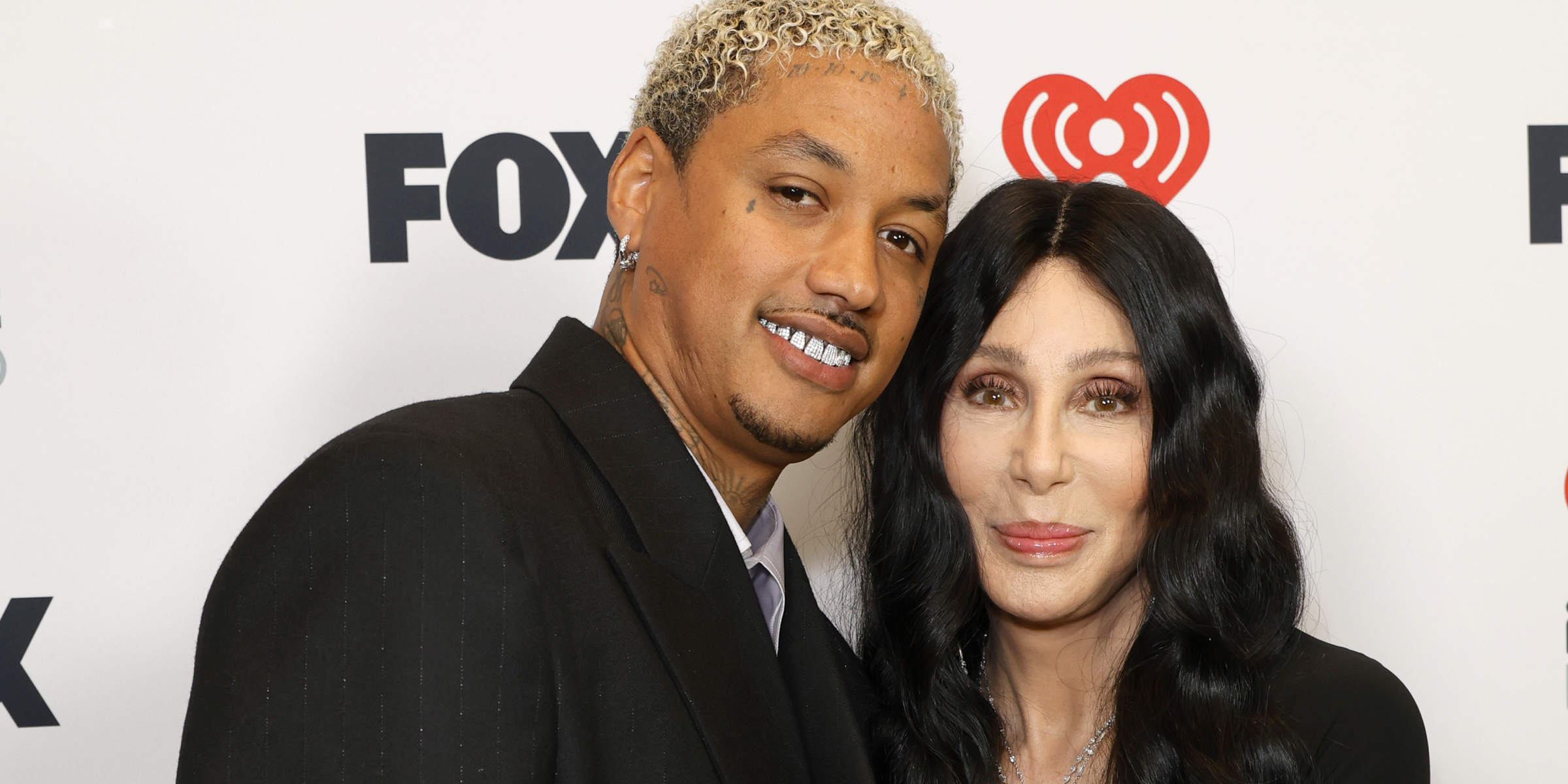 Alexander 'AE' Edwards and Cher | Source: Getty Images