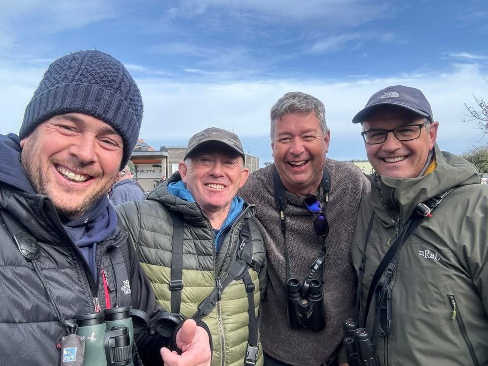 Chris Tynan (2R) poses with colleagues in a photo posted on 30 November 2025. | Source: X/austinmorley402