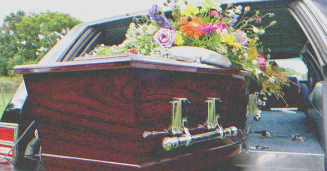 A coffin in a hearse | Source: Shutterstock